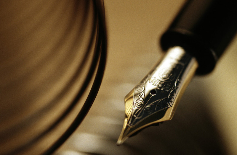 Federhalter als Symbol für Gästebuch